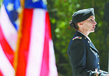Jim Grant/Nevada AppealNevada Army Guard Col. Maria Powers delivers the flag day address at the annual Flag Day Ceremony on Tuesday at the Veterans Memorial Wall.