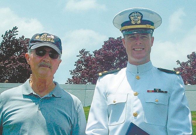 Courtesy photosEnsign Chad Shroy with former Carson Naval Junior ROTC instructor Skip Cannady after graduation.