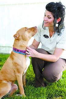 Shannon Litz/Nevada AppealAubrie Ricketts sits with Ruby outside Lone Mountain Veterinary Hospital on Thursday.