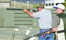 Shannon Litz/Nevada AppealSeventeen-year-old Bryce James and 14-year-old Tim Syriac shoot at the Capital City Gun Club prior to heading off to a national shooting match in Texas.