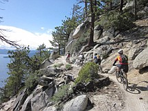 CourtesyRepresentatives from the Tahoe Area Mountain Biking Association take the events coordinator for the  International Mountain Bicycle Association on a ride over the Flume Trail. Lake Tahoe is one of three cities being considered for the International Mountain Bicycle Association World Summit.