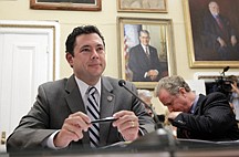 House Budget Committee members, Rep. Jason Chaffetz, R-Utah, left, and Rep. Chris Van Hollen, D-Md., right, testify before the House Rules Committee on the so-called &quot;cut, cap and balance&quot; plan proposed by tea party-backed House Republicans, at the Capitol in Washington, Monday, July 18, 2011. (AP Photo/J. Scott Applewhite)