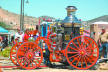 Rare opportunity to see 1879 steam fire engine fired up, pumping
