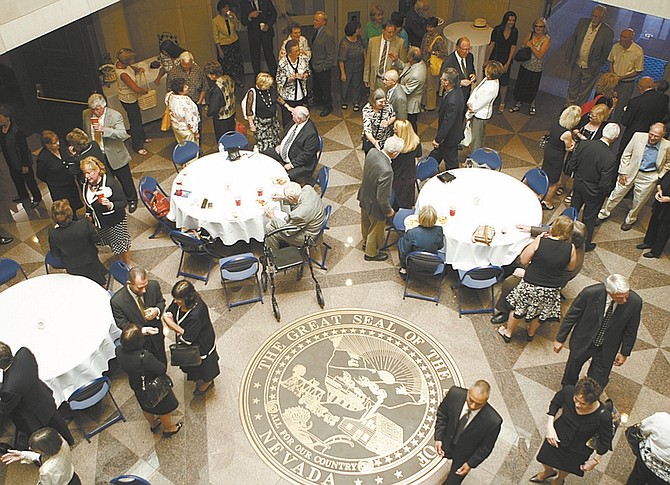 Shannon Litz/Nevada AppealPeople talk in the rotunda at the Nevada Supreme Court Building on Thursday afternoon following a memorial service for former Nevada Supreme Court Justice Cameron M. Batjer.