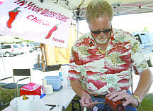 Shannon Litz/Nevada AppealJohn Medcraft of Reno puts together his chili called In Your Wildest Dreams on Saturday at Glen Eagles restaurant during the Carson City Chili Cookoff &amp; Craft Fair.