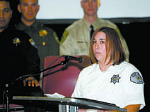 Shannon Litz/Nevada AppealWestern Nevada State Peace Officer Academy valedictorian Melanie Porter speaks during the graduation ceremony on Friday morning at Western Nevada College.