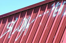 Shannon Litz/Nevada AppealGraffiti on a roof facade on Tuesday.