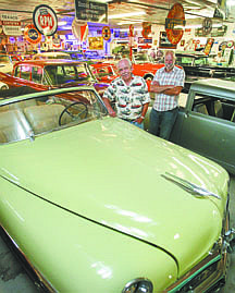 Jim Grant/Nevada AppealStanding next to a rare 1950 Lincoln Cosmopolitan convertible, Carson City resident Garth Richards, left, is working with Mitch Silver of Silver Collector Car Auctions in selling dozens of his classic cars and memorabilia from his private collection.