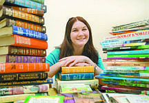 Jim Grant/Nevada AppealGirl Scout Margaret Duvall is collecting books to use for a fundraiser Saturday which will complete her Silver Scout merit project. The book sale will be from 1-6 p.m. in the library auditorium. All proceeds will go to Youth Services Librarian Amber Sady&#039;s library card outreach program for all kindergarten and pre-kindergarten students in the district.