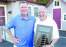 Shannon Litz/Nevada AppealCarson High School football coach Blair Roman with Bob Tresnit who received the Milan Tresnit Award on Saturday night. Tresnit has worked on the chain crew for 48 years.