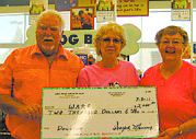 CourtesyRepresentatives of Wylie Animal Rescue Foundation receive a donation for it&#039;s work with animals of the community.