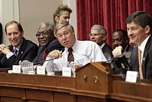 The Joint Select Committee on Deficit Reduction, often called the &quot;supercommittee,&quot; holds its first organizational meeting after being created out of the bipartisan compromise on the debt ceiling crisis in August, on Capitol Hill in Washington, Thursday, Sept. 8, 2011. From left to right are Rep. Dave Camp, R-Mich., Rep. James Clyburn, D-S.C., Rep. Fred Upton, R-Mich., and Rep. Jeb Hensarling, R-Texas, committee co-chair.   Made up of six Republican and six Democratic members of Congress, the panel is charged with finding, by Thanksgiving, $1.5 trillion in savings over the next decade. (AP Photo/J. Scott Applewhite)