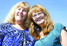 Shannon Litz/Nevada AppealBreast cancer survivors and coworkers Kellie Bowman and Mary Thompson pose Wednesday. The two will participate in Sunday&#039;s Susan G. Koman Race for the Cure in Reno.