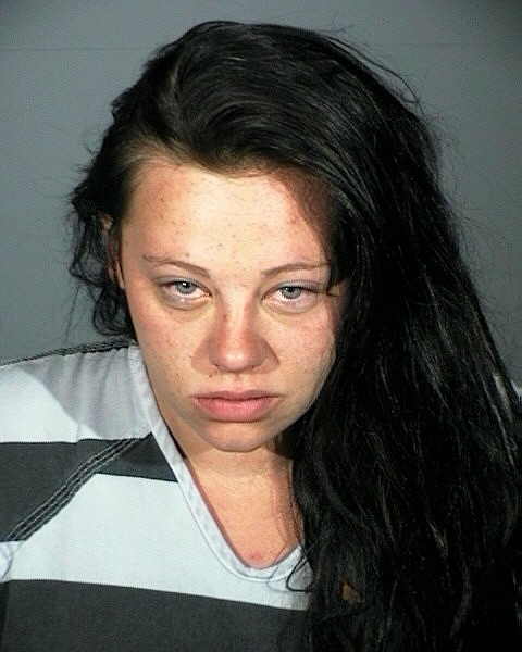 Crystal Trujillo, 26, is shown here in a July 2010, Carson City Sheriff&#039;s Office mugshot. She is wanted for questioning in a Thursday afternoon hit and run in which her boyfriend was critically injured.