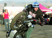 Nevada Appeal File PhotoStunt rider Jason Pullen performs at Carson City Harley-Davidson last year during their Street Vibrations celebration. Pullen will be performing again this year on Friday and Saturday at dealership on Research Way.
