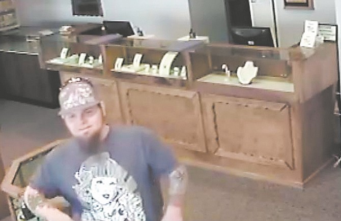 Two men are wanted for questioning in the Oct. 9 burglary of a CarsonStreet jeweler.