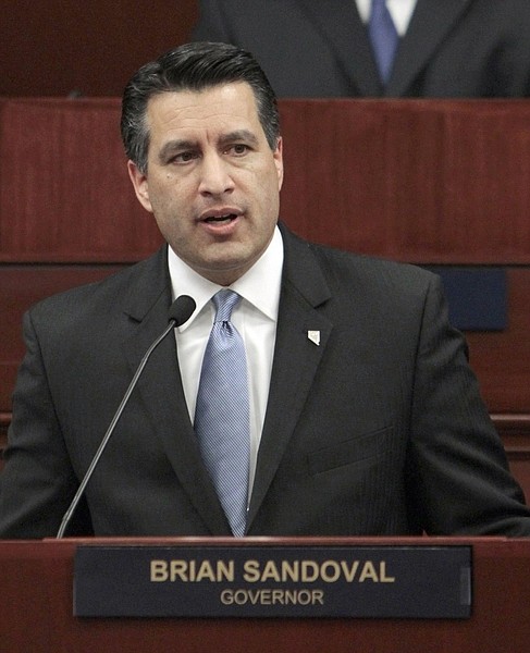 FILE - In this Jan. 24, 2011 file photo, Nevada Gov. Brian Sandoval makes his first State of the State address in Carson City, Nev. Sandoval, New Mexico Gov. Susana Martinez, and Florida Sen. Marc Rubio are popular, political newcomers who toe a safe party line in presidential battleground states. The rising GOP stars are also Hispanics, a fact the Republican Party clearly hopes to capitalize on in the upcoming national elections.  (AP Photo/Rich Pedroncelli, File)