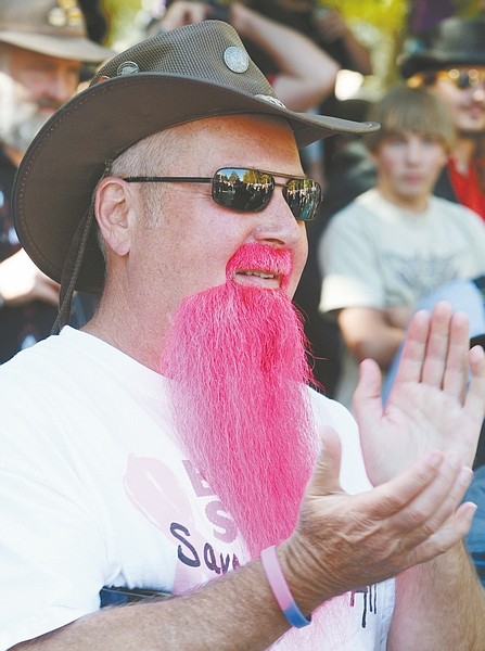 Jim Grant/Nevada Appeal Sporting a pink beard for breast cancer awareness, Neil Jacklin cheers on the competitors at the annual Beard Contest on Saturday afternoon. For more photos go to nevadaappeal.com/photos.