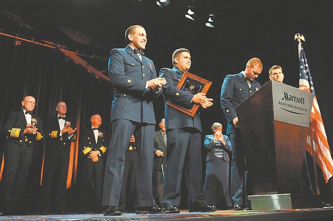 U.S. Coast GuardThe boat crew from Tillamook Bay, Ore., accepts the 2011 Coast Guard Foundation Award for Heroism in New York City on Oct. 13. From Left to right: Seaman Austin Bartosz, Petty Officer 3rd Class Matthew Karas, Fireman Michael Callahan, and Petty Officer 2nd Class, Conor Bennett.