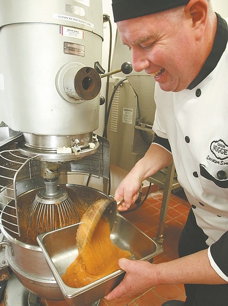 Jim Grant/Nevada AppealChef Michael Karsky prepares yams for the Carson Nugget&#039;s free Thanksgiving dinner.