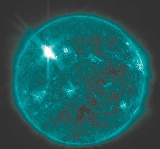This extreme ultraviolet wavelength image provided by NASA shows a solar flare. An impressive solar flare is heading toward Earth and could disrupt power grids, GPS and airplane flights. An impressive solar flare is heading toward Earth and could disrupt power grids, GPS and airplane flights. Forecasters at the National Oceanic and Atmospheric Administration&#039;s (NOAA) Space Weather Prediction Center said the sun erupted Tuesday evening and the effects should start smacking Earth late Wednesday night, close to midnight EST. They say it is the biggest in five years and growing. (AP Photo/NASA)