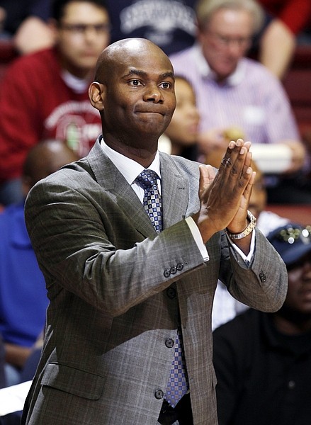 Nevada coach David Carter gestures during the first half against Stanford in a college basketball game in the NIT quarterfinals, Wednesday, March 21, 2012, in Stanford, Calif.  (AP Photo/Paul Sakuma)