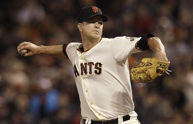 San Francisco Giants pitcher Matt Cain delivers against the Houston Astros during the sixth inning of a baseball game in San Francisco, Wednesday, June 13, 2012. (AP Photo/Jeff Chiu)