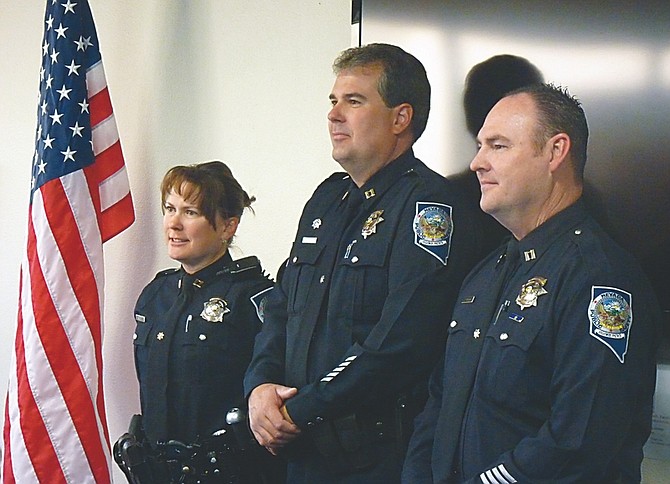 Nick Coltrain / Nevada AppealThe three new Nevada Highway Patrol captains pose for a photo Thursday after the pinning ceremony at the Department of Public Safety. From left: Capts. Susan Aller-Schilling, Tom Merschel and John O&#039;Rourke.