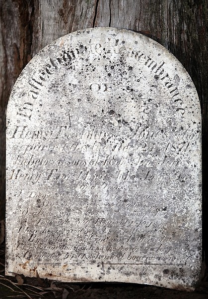 This February 2012 photo shows the tombstone for the family of Robert Jones, which was stolen from the Gold Hill Cemetery in Virginia City, Nev. sometime after 1974. The tombstone, which the church has had since Jean Hood Mickelsen found it in 1978 and brought it to the church, has been returned to the Comstock Cemetery Foundation. (AP Photo/The Press Democrat, Christopher Chung)