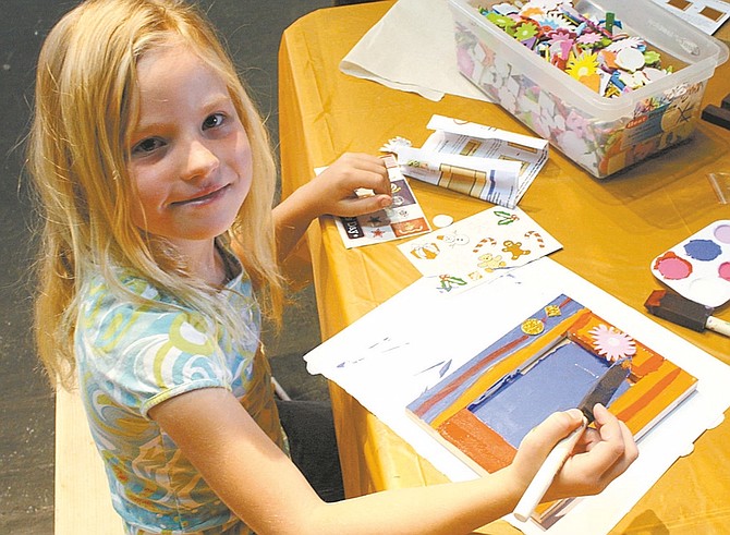 Photos by Wheeler Cowperthwaite / Nevada AppealTempess Hagens, 7, paints a picture frame she assembled for her mother&#038;#8217;s birthday.