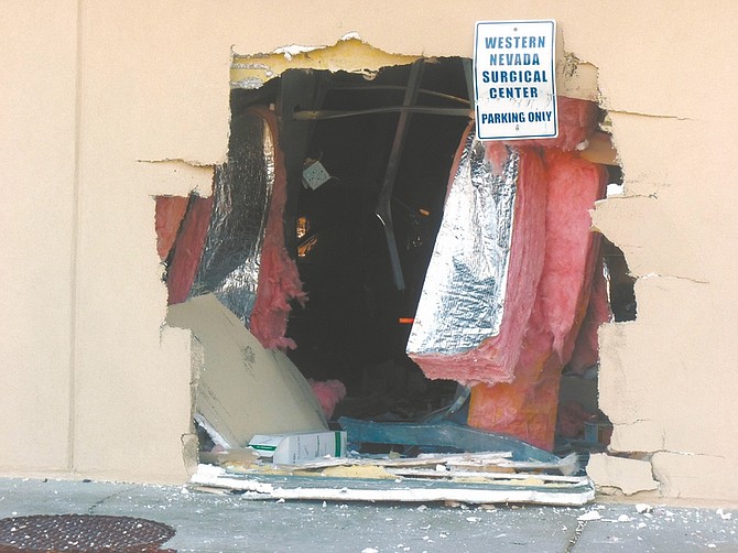 Wheeler Cowperthwaite / Nevada AppealThree people were injured Thursday morning when a Toyota RAV4 rammed into the back of the Western Nevada Surgical Center.