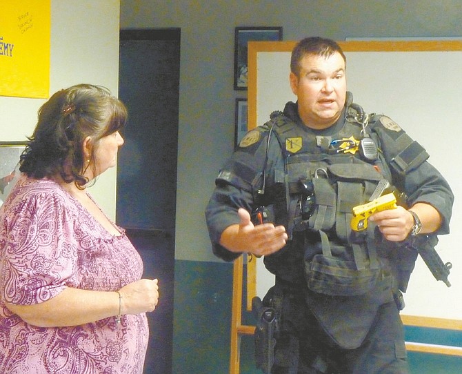 Photos by Wheeler Cowperthwaite / Nevada AppealDeputy Chris Rivera talks about Taser guns during Wednesday&#039;s Citizens Academy.
