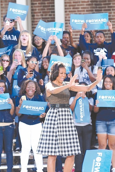 Geoff Dornan / Nevada AppealFirst lady Michelle Obama greets supporters on the campus of the University of Nevada, Reno, on Wednesday.