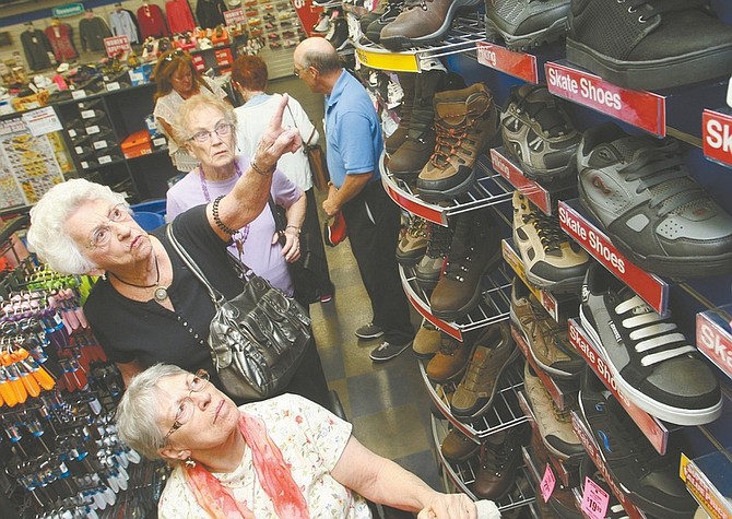 Jim Grant / Nevada AppealResidents of The Lodge, an assisted living community, shop for shoes at Big 5 Sporting Goods on Monday.