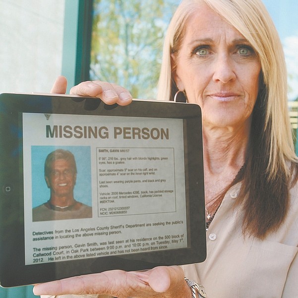 Jim Grant / Nevada AppealTara Smith Addeo of Minden displays a Missing Person flier about her brother Gavin Smith who disappeared in California on May 1.
