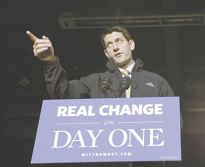 Republican vice presidential candidate, Rep. Paul Ryan, R-Wis. gestures as he speaks during a campaign event, Monday, Nov. 5, 2012 in Reno, Nev.  (AP Photo/Mary Altaffer)