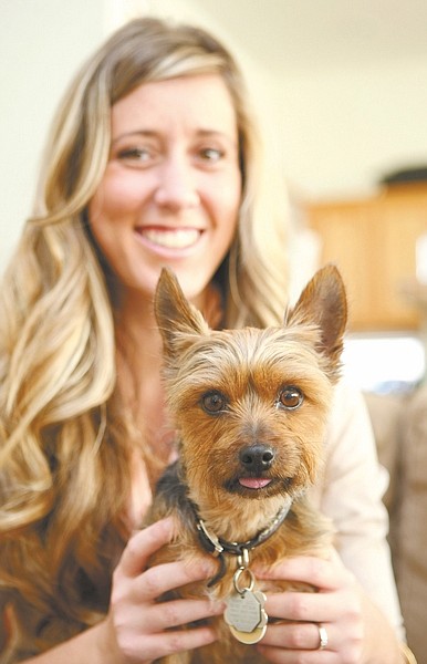 Shannon Litz / Nevada AppealEighteen-year-old Cara Dopf holds Polo, an 8-year-old Yorkshire terrier, on Wednesday.