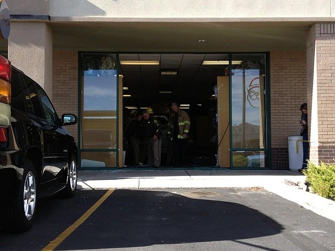 Shannon Litz/ Nevada AppealA sport utility vehicle drove into the Tuesday Morning store Friday morning.  At least three people were injured.