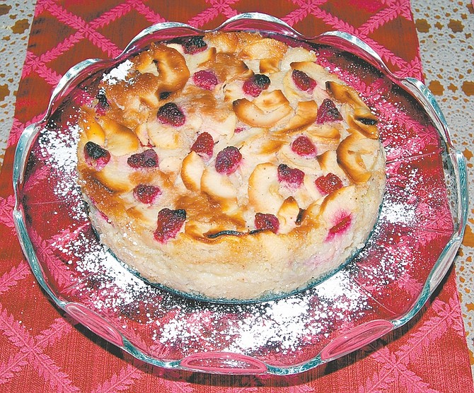 CourtesyCarolyn Eichin&#038;#8217;s Farmhouse Apple Cake with raspberries.