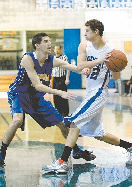 Courtesy Kimberley Gwyther-KingCarson&#038;#8217;s Sage Smith looks to pass during Friday&#038;#8217;s game at the San Diego Holiday Classic.