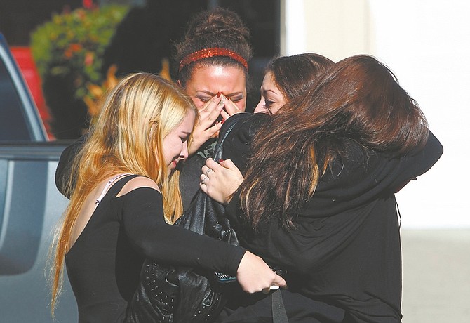 From left, Mariah Harvey, 17, Jazmine Taylor, 18, Taylor Dardis, 17, and Chanel Kelly, 16 cry together outside the Petaluma, Calif. home of their friend, Alyssa Byrne, 19, whose body was discovered Friday morning, Jan. 4, 2013 in South Lake Tahoe. Byrne was reported missing on New Year&#039;s Eve. (AP Photo/The Press Democrat, John Burgess)
