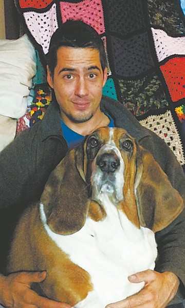 Andrew W. Russell with Fredrick the Basset Hound.