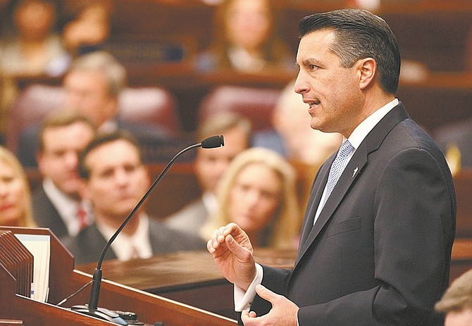 Shannon Litz / Nevada AppealNevada Gov. Brian Sandoval speaks during the State of the State address on Wednesday evening.