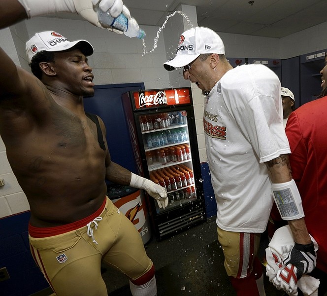 San Francisco 49ers&#039; Colin Kaepernick has water thrown on him as he celebrates with teammates after the NFL football NFC Championship game against the Atlanta Falcons Sunday, Jan. 20, 2013, in Atlanta. The 49ers won 28-24 to advance to Super Bowl XLVII. (AP Photo/Dave Martin)