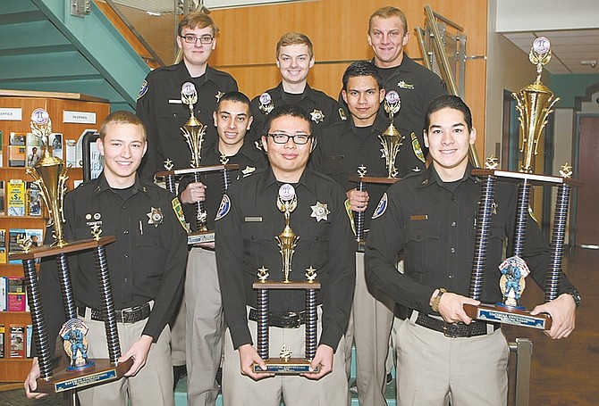 Shannon Litz / Nevada AppealCarson City Sheriff&#038;#8217;s Explorers are, back row, Austin Nichols, Joshua Van Sickle and Luke Remer. Middle row: Isaac Ramirez and Alejandro Gomez and in the front are Capt. Ian Carl, Tulio Marroquin and Sgt. Elan Flores. The explorers competed in the Tactical Competition in Chandler, Ariz.