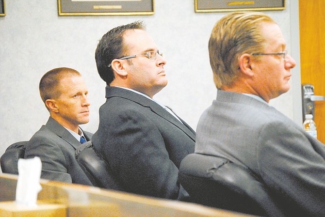 Steve Puterski / Lahontan Valley newsKeith Alan Thomas of Carson City listens to Senior Judge Robert Estes after a not guilty verdict on Friday in the Tenth Judicial District Court in Fallon. Thomas faced two felony weapons charges stemming from a shooting on Aug. 16, 2011.