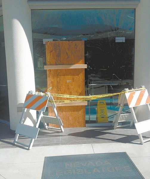 Geoff Dornan / Nevada AppealA glass door at the Nevada Legislature was accidentally broken by a worker who was trying to repair it.