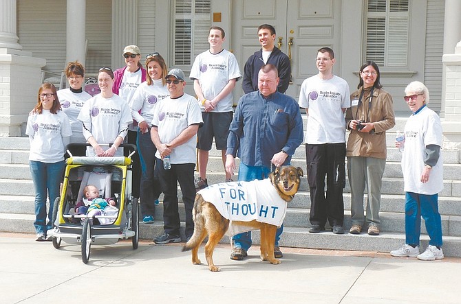 Photos by Sally Roberts / Nevada AppealMembers of the Brain Injury Alliance-of Nevada gather Saturday at the Governor&#038;#8217;s-Mansion before a two-mile &#038;#8220;Walk for Thought.&#038;#8221;