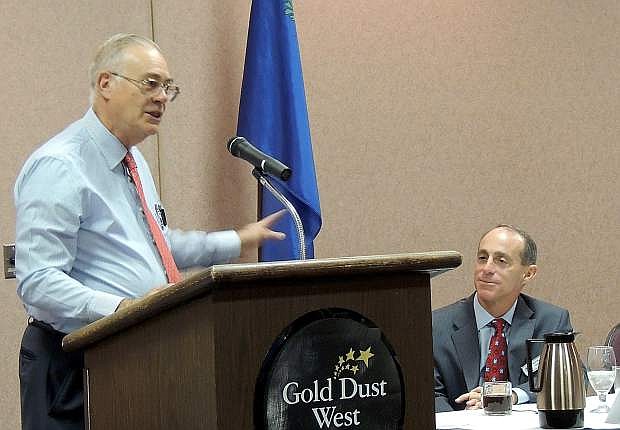Ray Bacon, left, of the Nevada Manufacturers Association introduces Carson City Manager Nick Marano during Wednesday&#039;s breakfast meeting at the Gold Dust West.