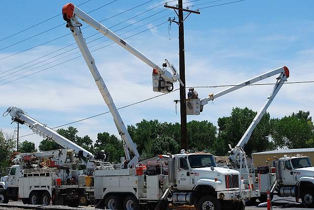 NV Energy crews worked on two poles on Monday after a weekend accident damaged them.